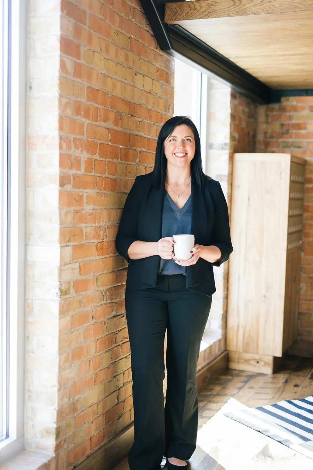 Woman in a sleek professional suit outfit