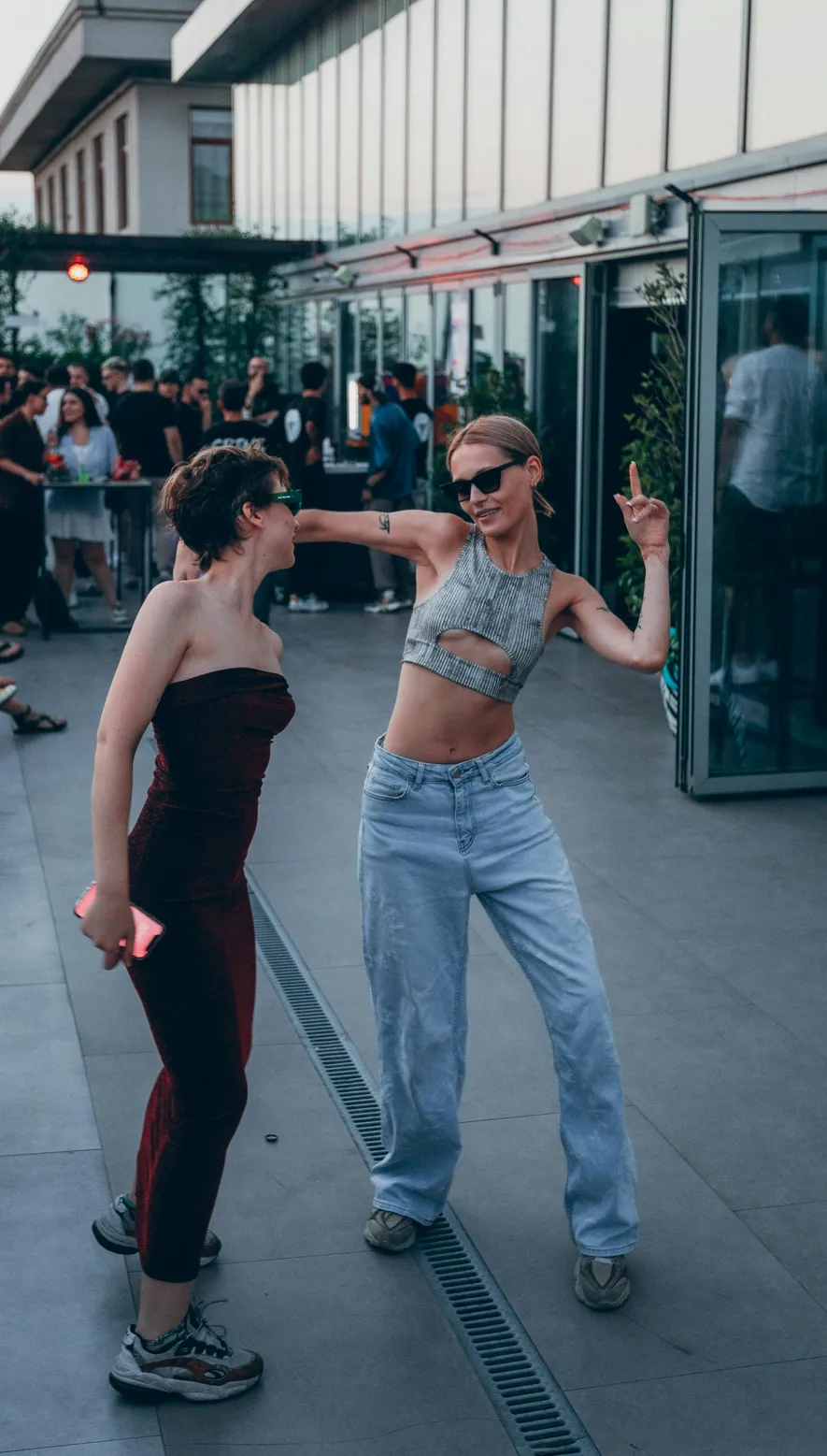 Bustier paired with high-waisted denim pants for a festival look