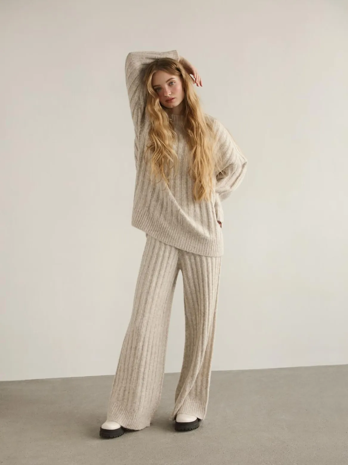 Monochromatic neutral outfit with cashmere sweater and wool pants